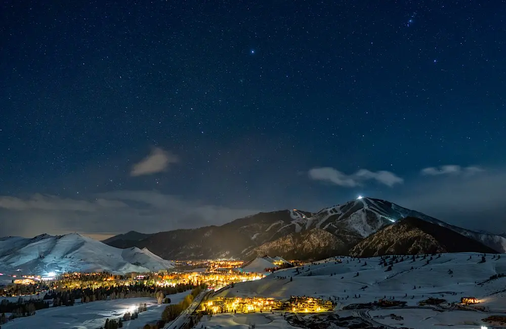 Stars shine above Sun Valley Resort and its surrounding snow-covered mountains in central Idaho. Credit: Cooper Morton / Sun Valley Resort