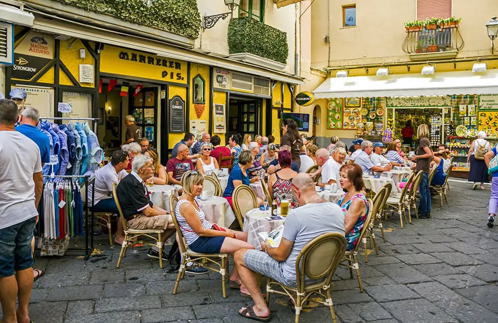 Tourists at an outdoor cafe in Sorrento, Italy. Image: George Standen/iStock