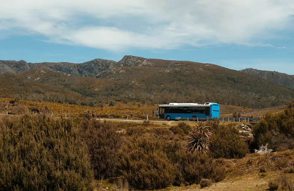 Tasmania boosts travel with free public transport until mid-2027 1 Tassie's free public transport - Bus entering Lake St Clair-Cradle Mountain National Park in Tasmania, Australia. Image: Oleh_Slobodeniuk/iStock