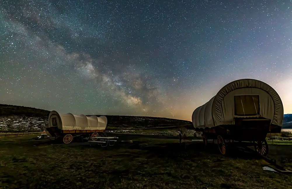 Utah eyes 2034 Winter Olympics with flurry of upgraded visitor experiences you can enjoy now 8 The Milky Way puts on a show over Conestoga wagons at East Canyon State Park – 56km from Salt Lake City. Image: Ryan Andreasen/Visit Utah