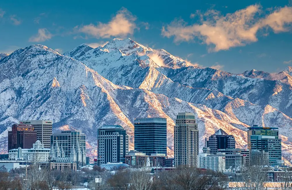 Utah eyes 2034 Winter Olympics with flurry of upgraded visitor experiences you can enjoy now 11 Salt Lake City skyline in winter with snow-capped Wasatch Range. Image: Jay Dash Photography/Visit Utah
