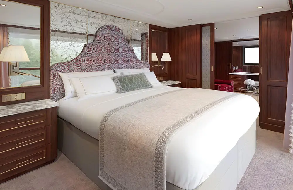 Render of Grand Suite bedroom on S.S. Clara. Image: Uniworld Boutique River Cruises