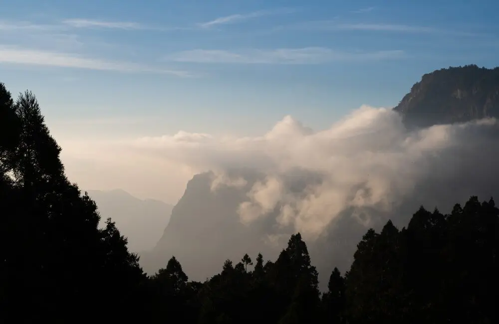 InsideAsia launches Taiwan as demand grows for cultural travel across Asia 4 Tree linked mountain in foreground with clouds and background mountains