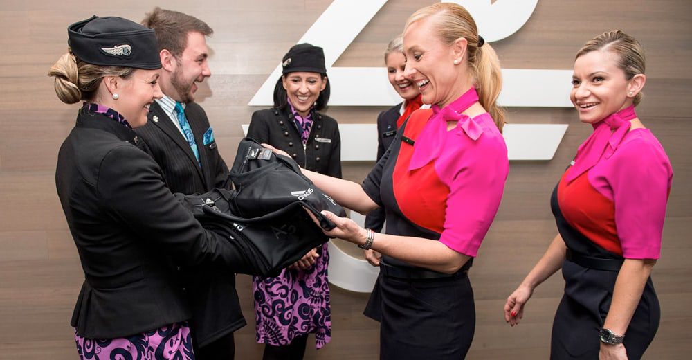 Qantas goes 'All Black' after losing Air NZ wager