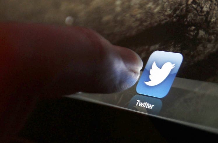 An illustration picture shows the log-on icon for the Twitter website on an iPad in Bordeaux, southwestern France, in this January 30, 2013 file photo. Anonymous hackers attacked Twitter this week and may have gained access to passwords and other information for as many as 250,000 user accounts, the microblog revealed late on February 1, 2013. REUTERS/Regis Duvignau/Files (FRANCE - Tags: SCIENCE TECHNOLOGY BUSINESS)