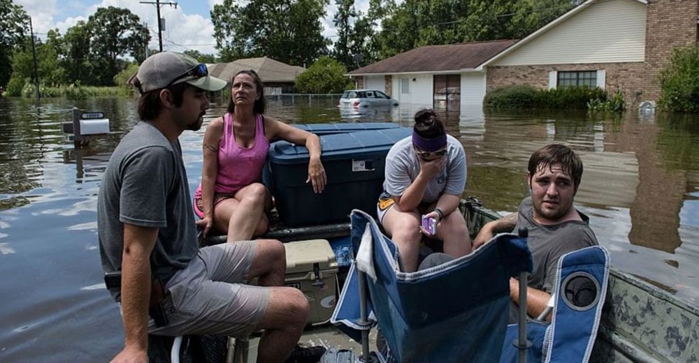 Severe floods in Louisiana kill 13 and damage over 40,000 homes
