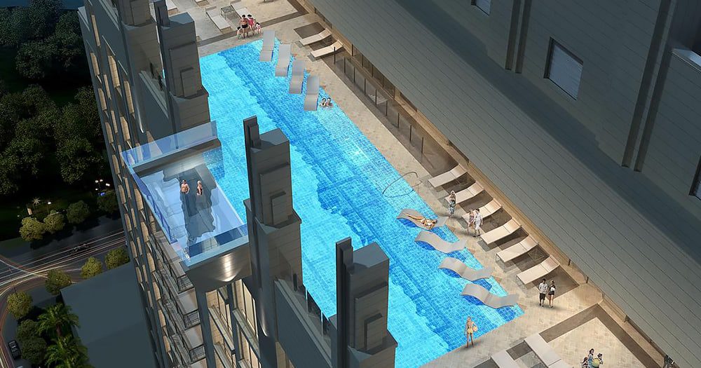 Swim and fly at the same time in the scariest see through pool