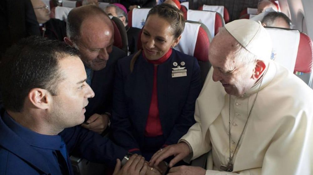 Pope spontaneously marries flight attendants mid-flight