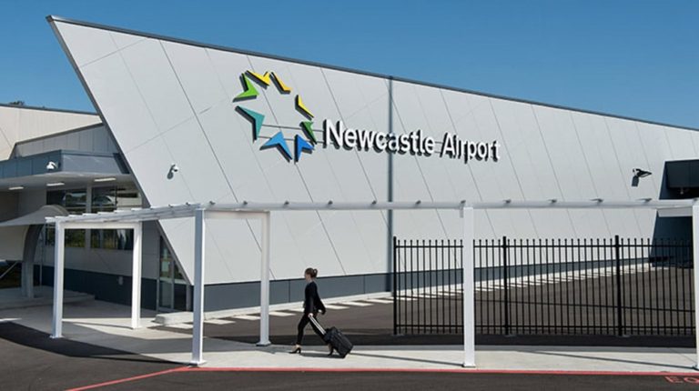Newcastle Airport reopens as bush fires ease