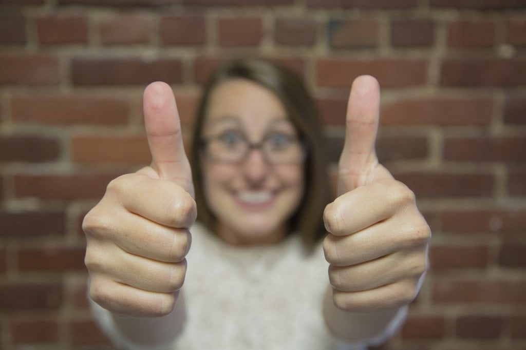 Why we can all learn a few things from the French 13 Thumbs up woman Pixabay KarryOn