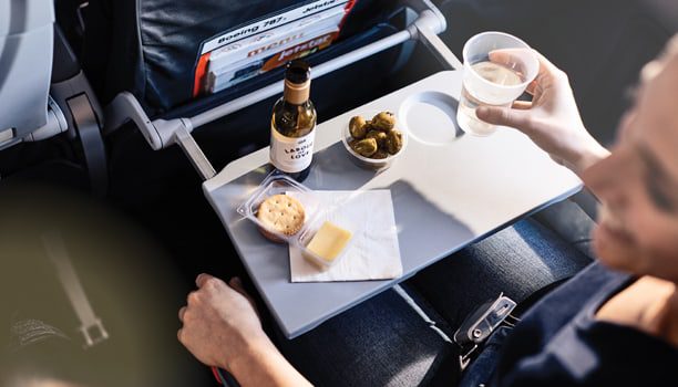 Sky-high happy hour: Which Aussie-bound budget airline serves the cheapest inflight booze? 2 karryon-jetstar-612x350_4