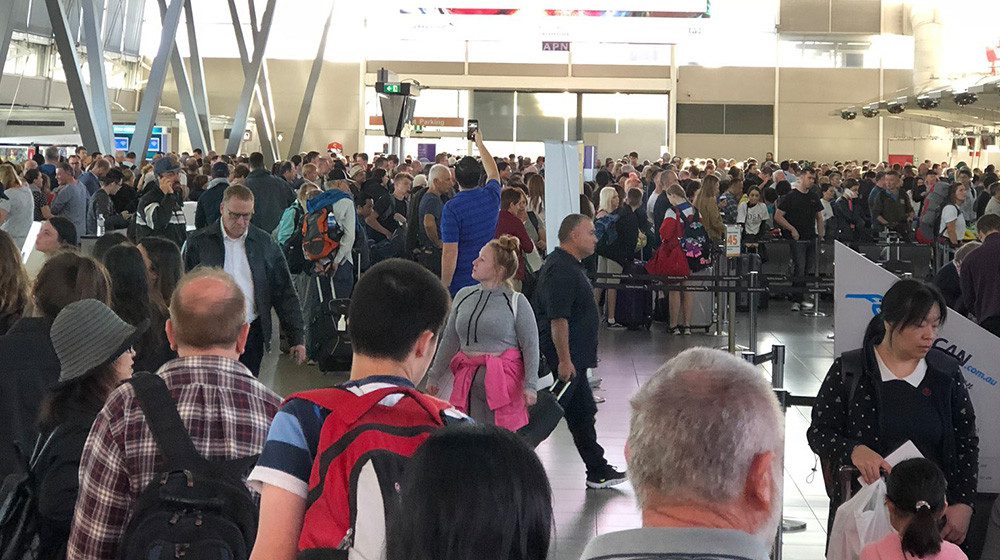 SYDNEY'S SPECTACLE: 100 flights cancelled at Sydney Airport over heavy rain