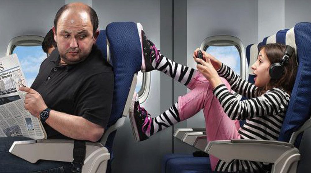 STOP: How airline passengers deal with kids kicking the back of their seat