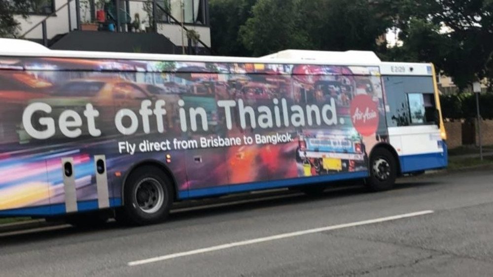 GET OFF IN THAILAND: The uncomfortable bus slogan getting around Brisbane