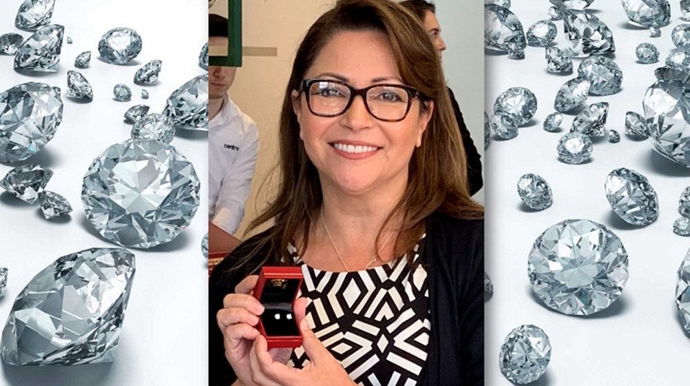 WORLD'S BEST BOSSES: Spencer Travel gifts ANOTHER employee with one carat diamond