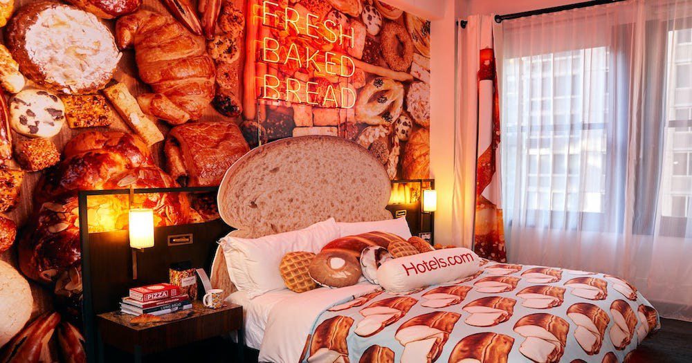 BREAD & BREAKFAST: Stay In A Carb-Tastic Suite With A Wall Of Treats