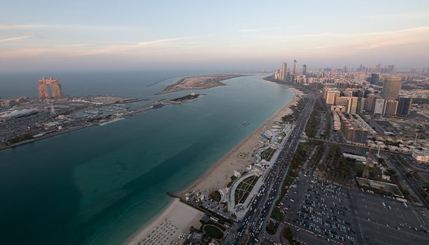 Scenery of the Abu Dhabi Corniche skyline and Corniche Beach during the daytime