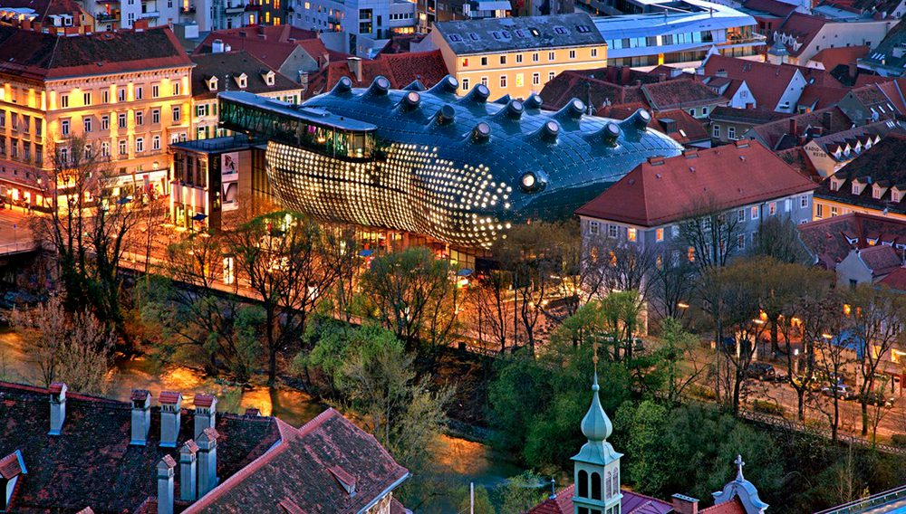 View to Graz Kunsthaus in the evening. Image credit: Julius Silver