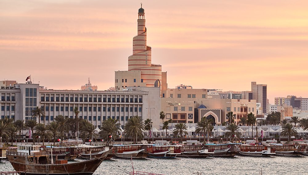 Take a cruise on a traditional wooden dhow along Doha Corniche