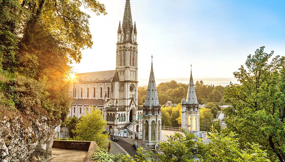 See the Sanctuaires Notre-Dame de Lourdes and the Massabielle Grotto in the town of Lourdes