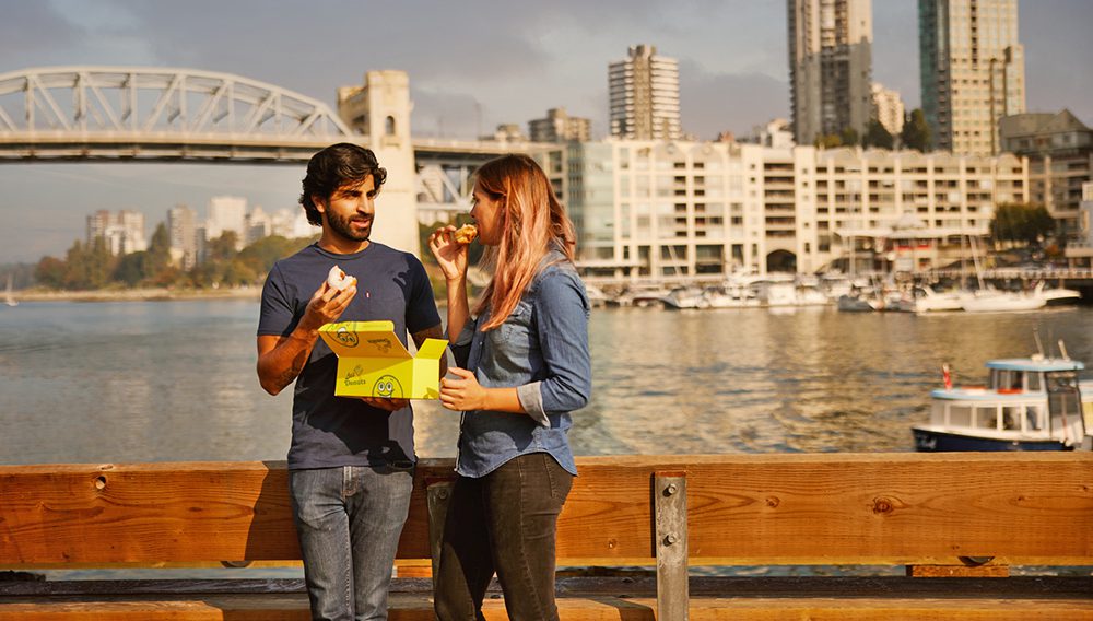 The Granville Island Public Market sells a tasty assortment of food and produce. Image credit: Destination BC/Hubert Kang