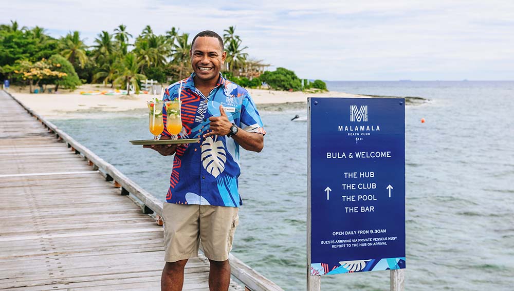 Malamala Beach Club Fiji Jetty welcome credit Andrew Lewthwaite