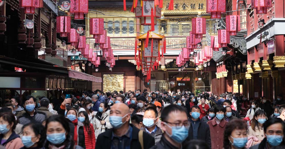Crowd of people in temple for Lunar New Year in Shanghai, China.