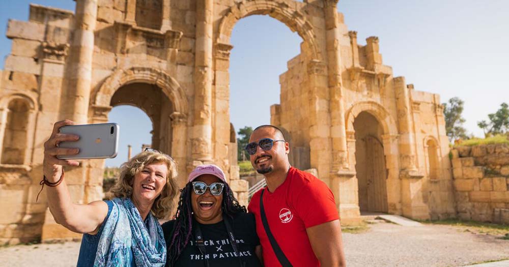 DFAT reverses travel warnings for Middle East nations; strong Aussie bookings for nearby countries 4 Three people on tour in Jordan