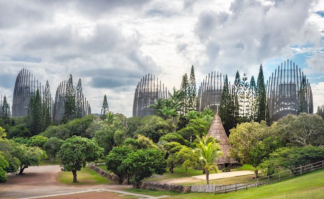 Tjibaou Cultural Centre, a Kanak native museum, made mainly of ten ribbed structures made of steel and Iroko wood, inspired by the form of traditional Kanak huts