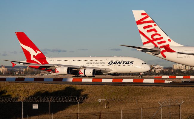 Taxiing Qantas and Virgin Australia planes.