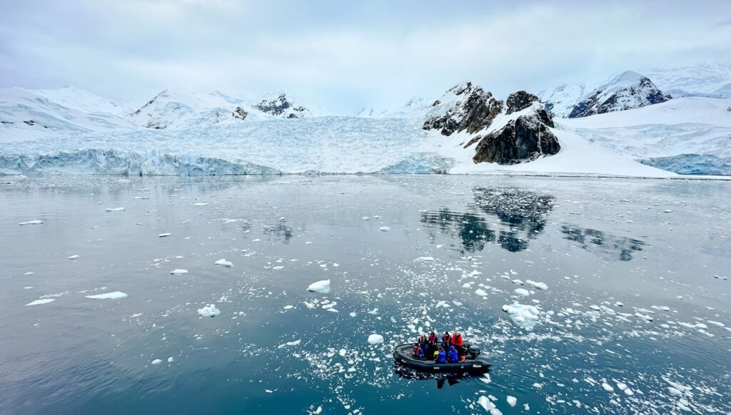 Zodiac cruising with dramatic landscapes, Cierva Cove, Antarctica, © Lina Stock @ Divergent Travelers