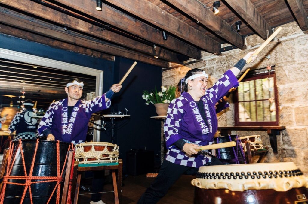 Sally playing the Japanese taiko. Karryon