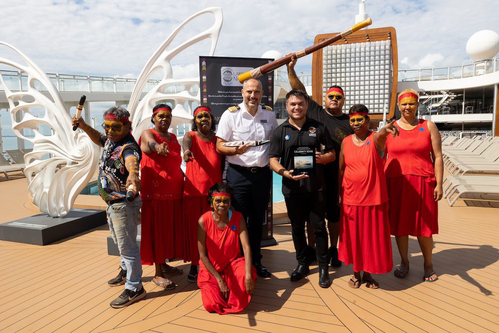 Luxury cruise ship Celebrity Cruises Captain Matt Karandreas being gifted a wooden crocodile after a Welcome to Country by Larrakia Nation.