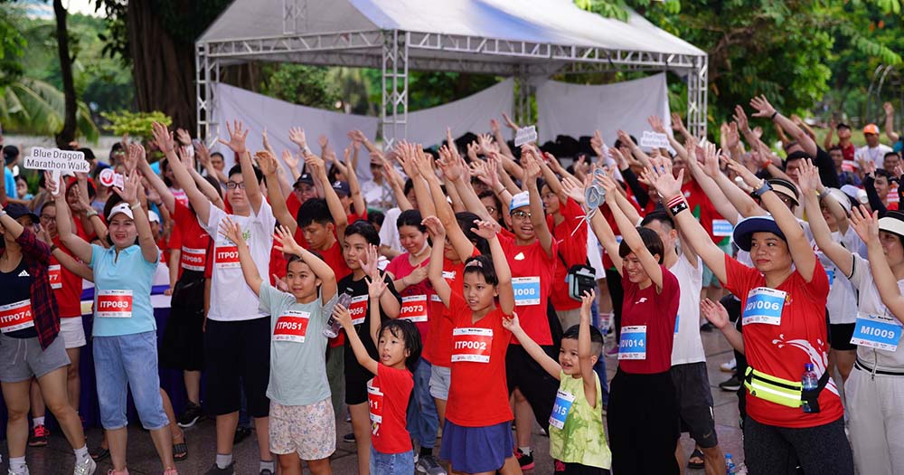 Participants limber up for The Intrepid Foundation's Blue Dragon Marathon Walk charity event in Vietnam.