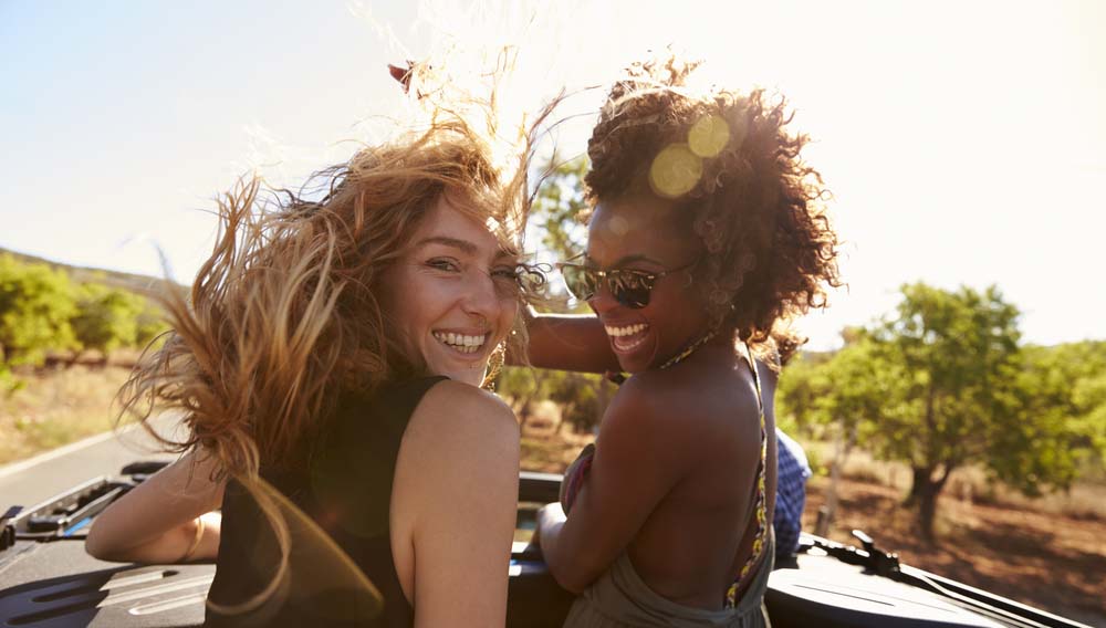 Millennials and Gen Z women on road trip