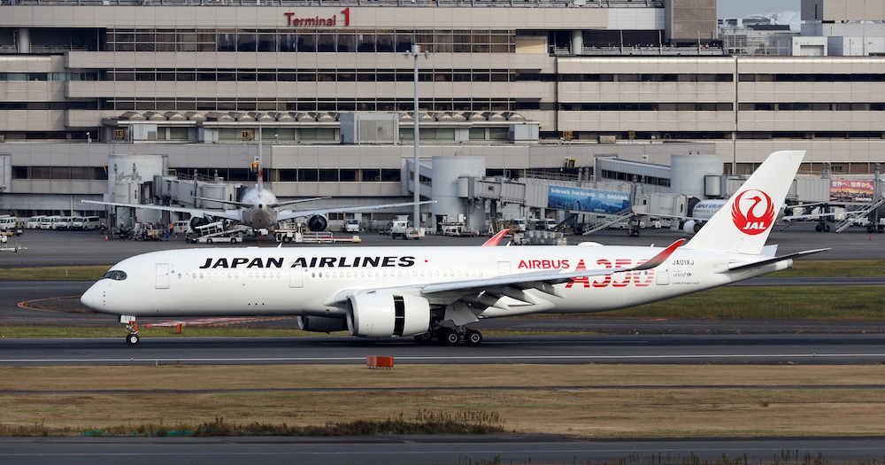 Aussies on board Japan Airlines jet that burst into flames after a collision at Tokyo Airport