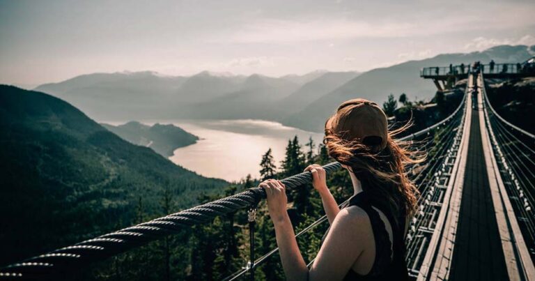 BC Person viewing Howe Sound from the Sky Pilot Suspension Bridge at the Sea to Sky Gondola in Squamish