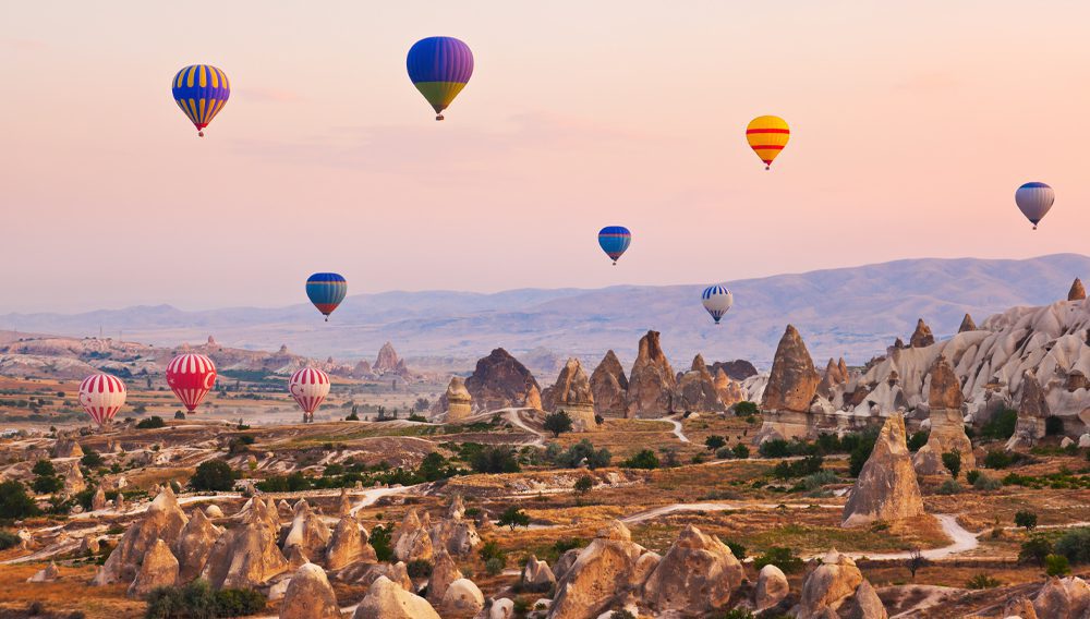 Explore Worldwide tour in Turkey's Cappadocia region with hot-air balloons.