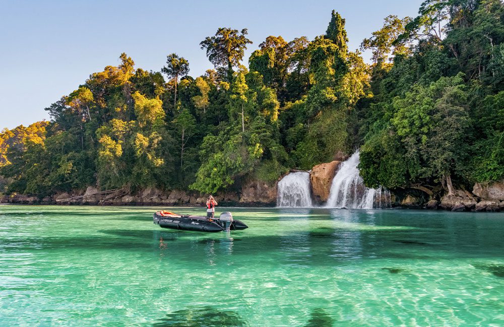 Ponant in West Papua at the KitiKiti Waterfall. Credit: ©StudioPONANT Juliette Leclercq_cruise