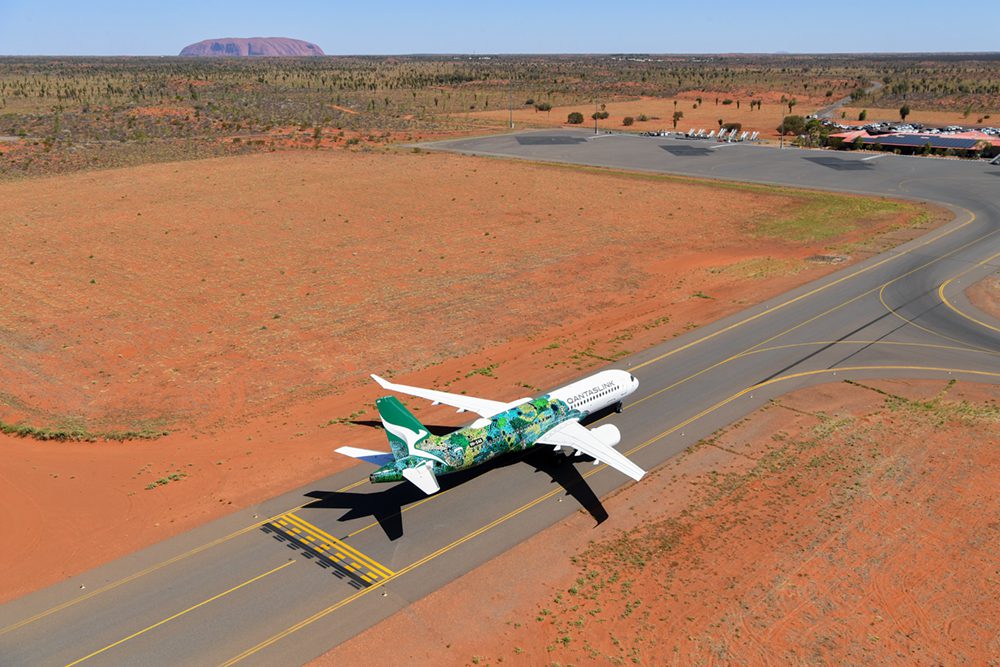 QantasLink_A220-300_Uluru_flight_Runway