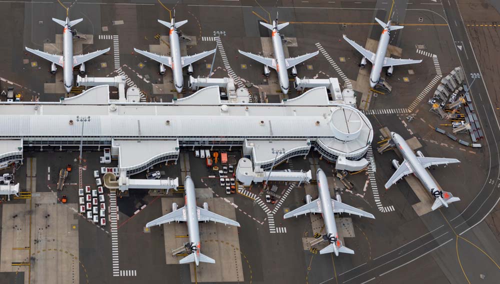 Aerial shot of Jetstar aircraft demonstrating Sydney Airport slot demand.