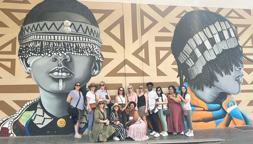 SAT Above Beyond Holidays Honey Badgers Team on an walking art tour of Joburg