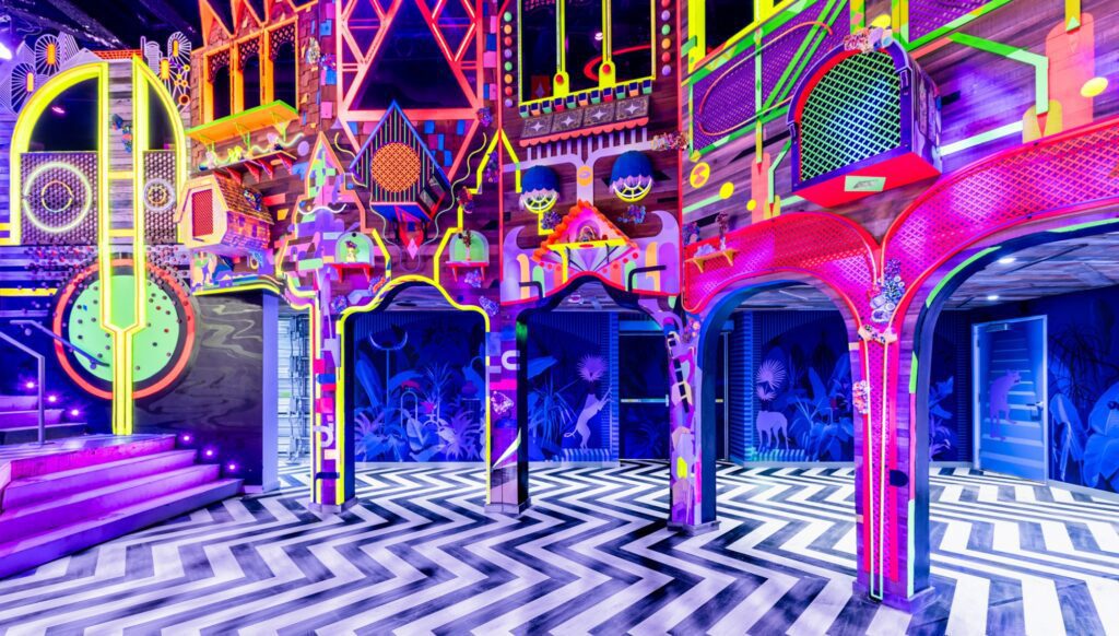 A bright colourful art display from Meow Wolf