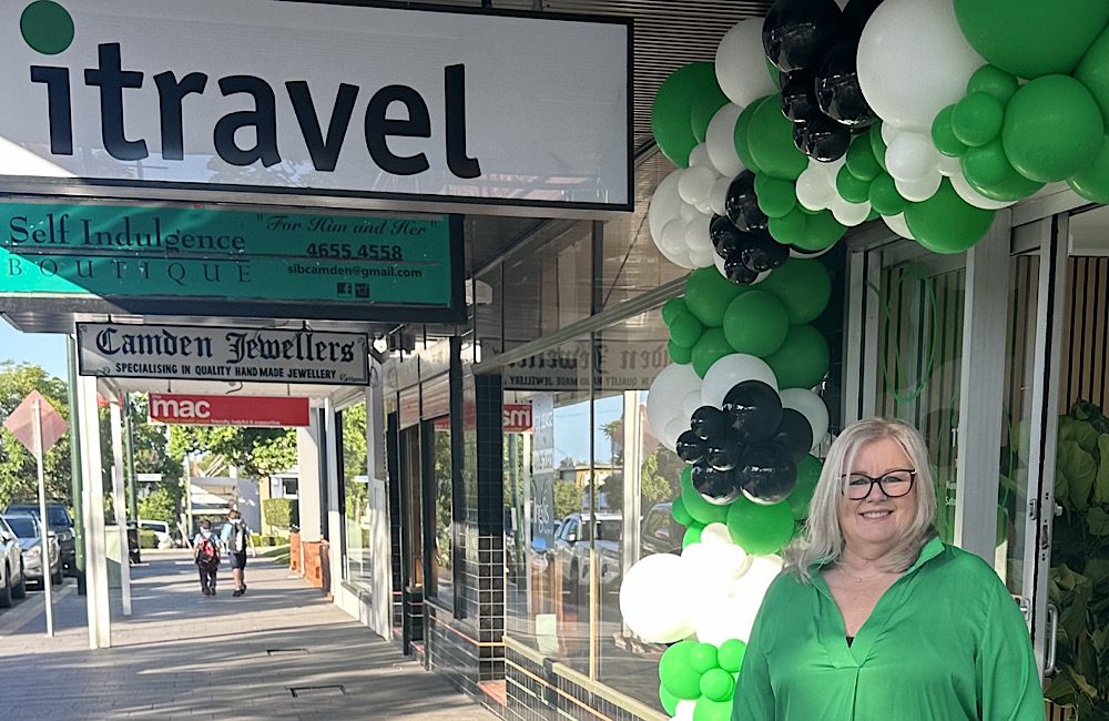 Travel agent Christine Kelly in front of her new store, itravel Camden.