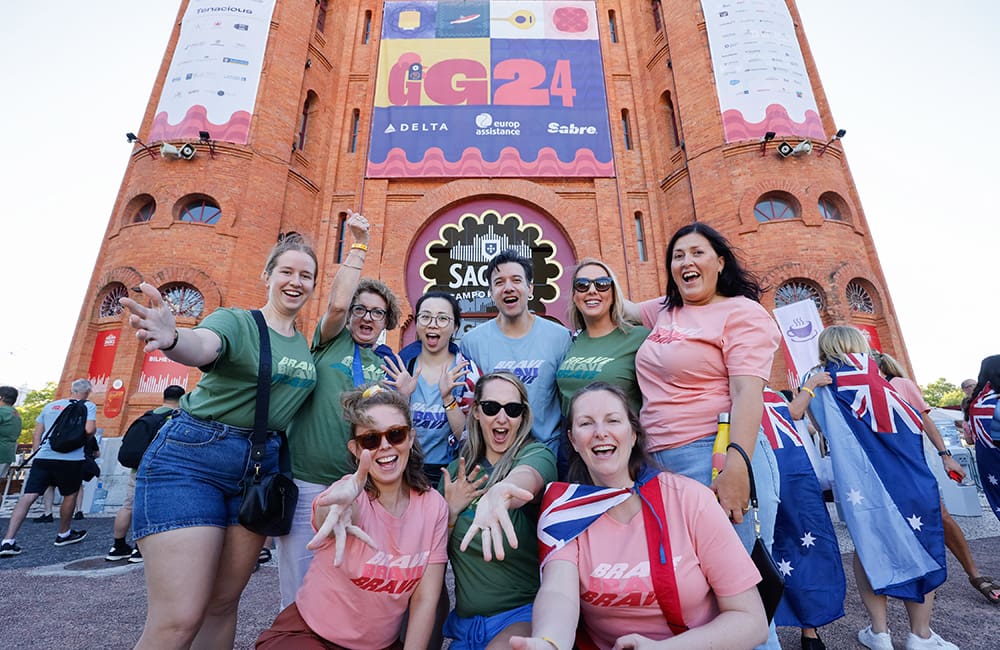 FCTG travel agents wearing Australian flags outside Campo Pequeno in Lisbon, Portugal for Global Gathering 2024.