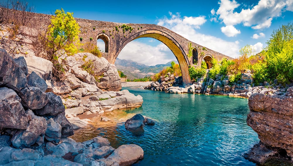 Mesi Bridge is a bridge in the village of Mes, northeast of Shkodër, in northwestern Albania.