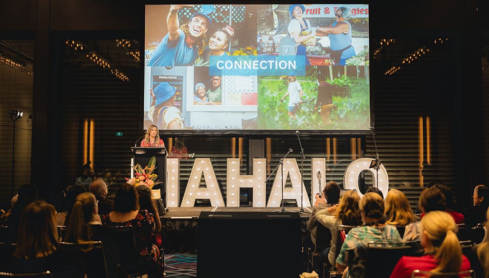 Wide shot of audience at presentation at Aloha Down Under 2024 event.