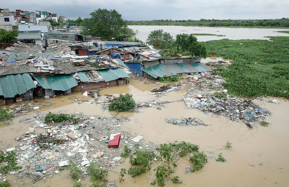 Intrepid launches emergency Vietnam appeal in wake of Super Typhoon Yagi; trips still operating 1 Flooding in Northern Vietnam village.