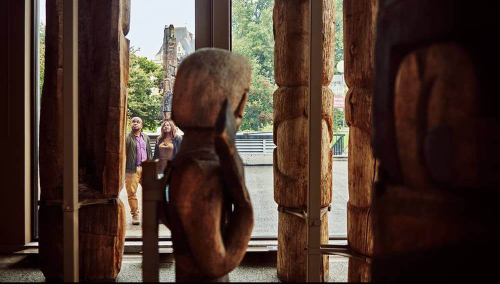 Couple looking at art at Royal BC Museum in Victoria, Vancouver Island. Image: Destination BC/Hubert Kang