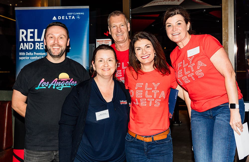 Group of people at Delta Air Lines & LA Tourism event at Gold Coast. (L-R): LA Tourism’s Craig Gibbons with winner Melissa Deering (Helloworld Southport) and Delta Air Lines’ Clint Jones  Nicole Laurie & Kelly Clive.